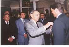 الحسن الثاني يوشح هنري ميشال